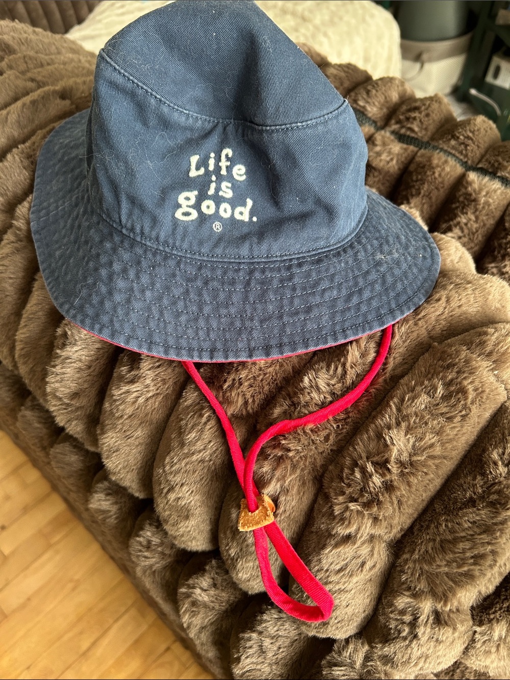 Life is Good Navy Bucket Hat with Red Chin Strap